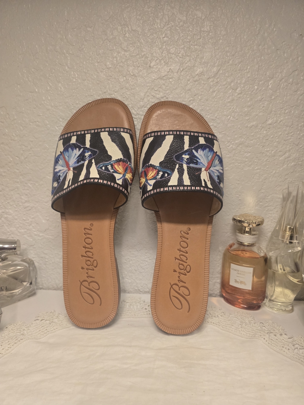 Brighton Zebra-Print Slide Sandals with Butterfly Accents